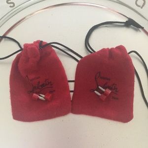Authentic Christian Louboutin pouches with tips